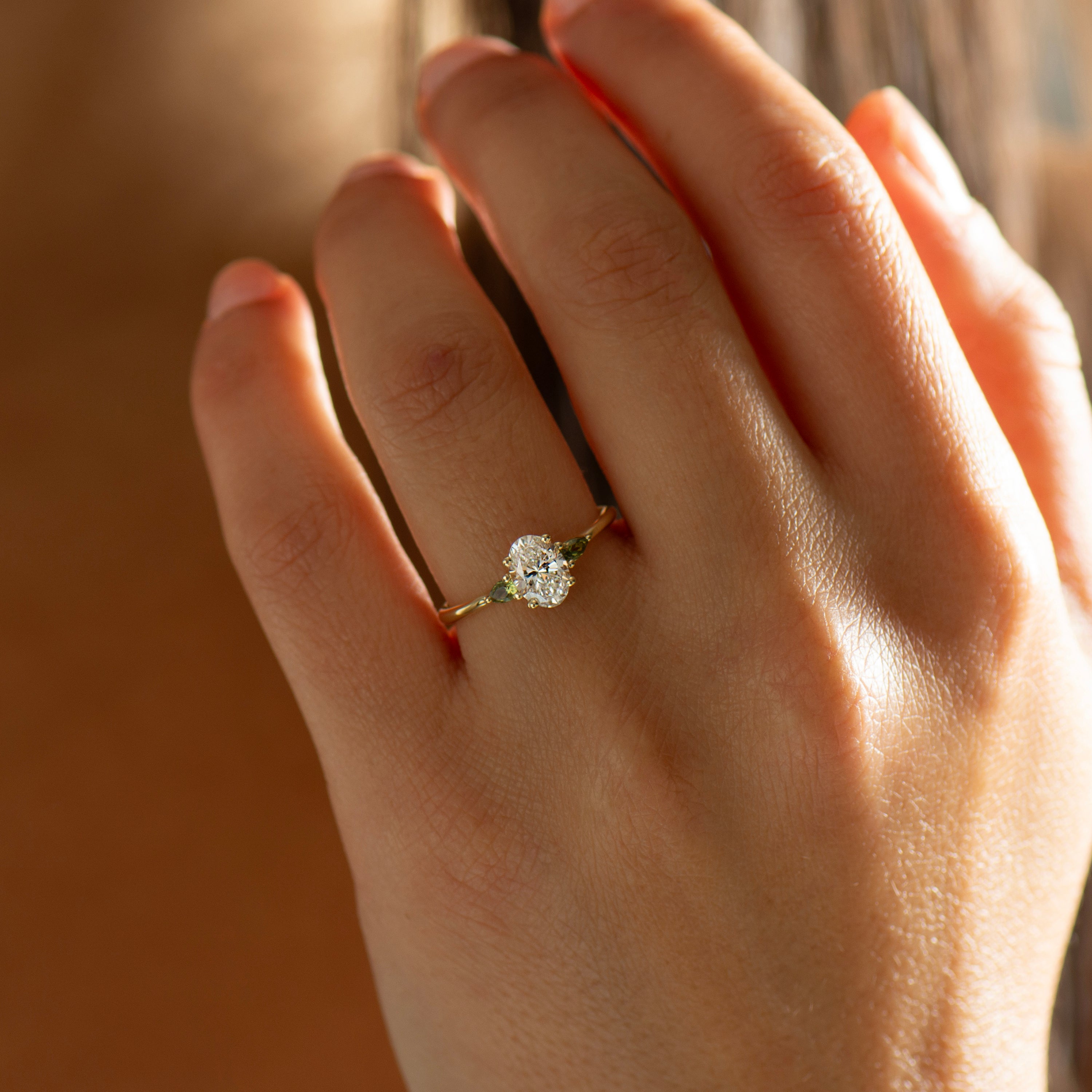 Oval Diamond And Green Sapphire Ring