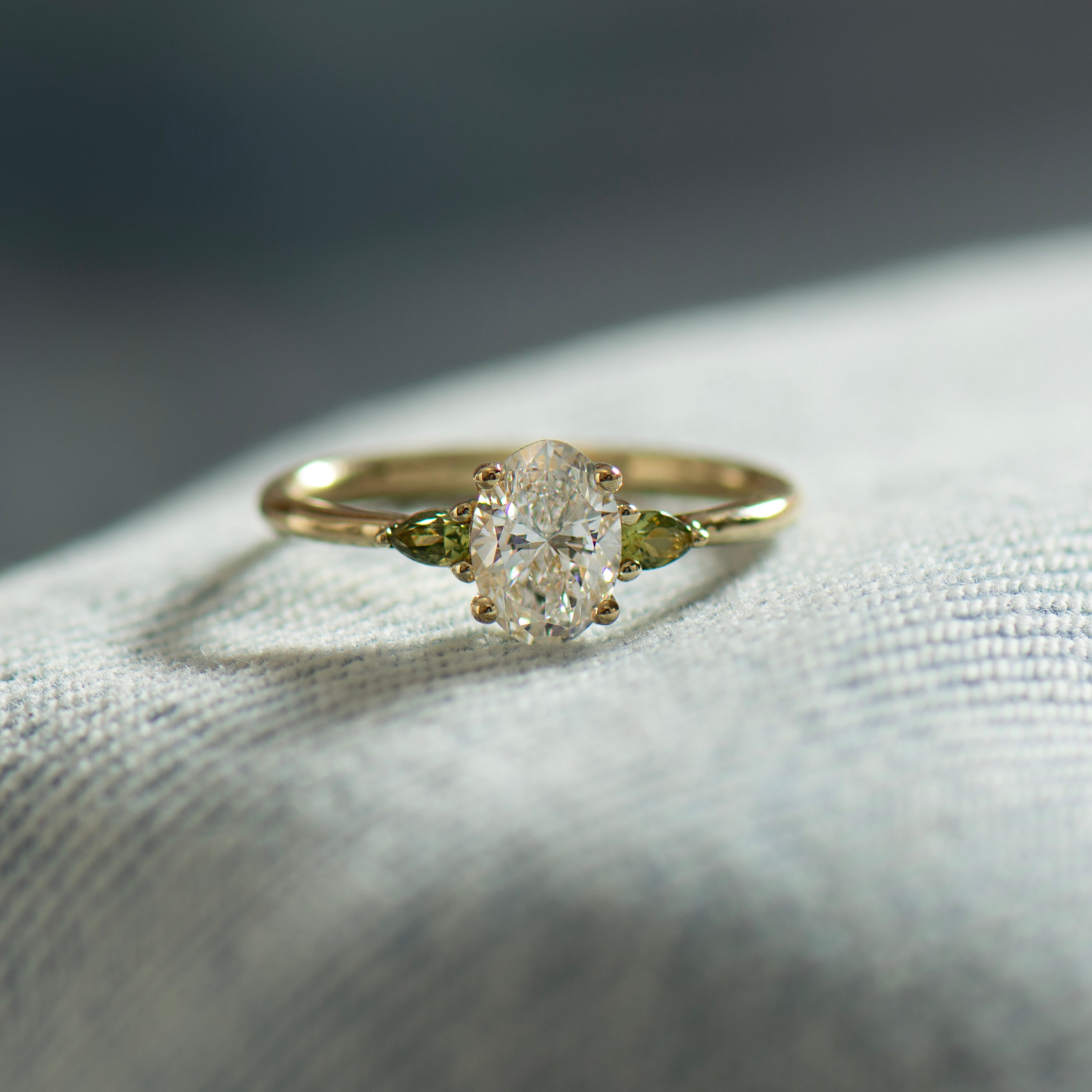 Oval Diamond And Green Sapphire Ring