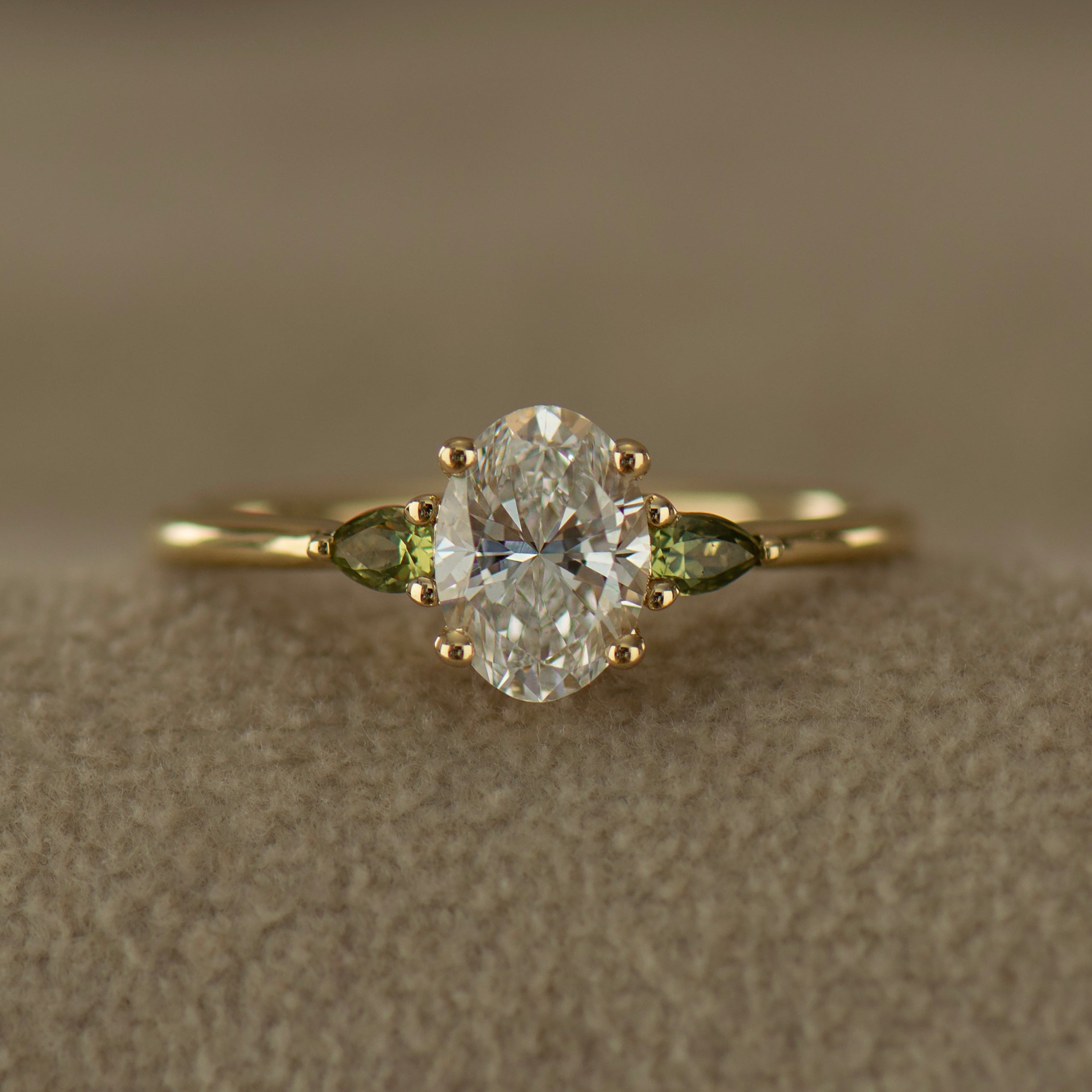 Oval Diamond And Green Sapphire Ring