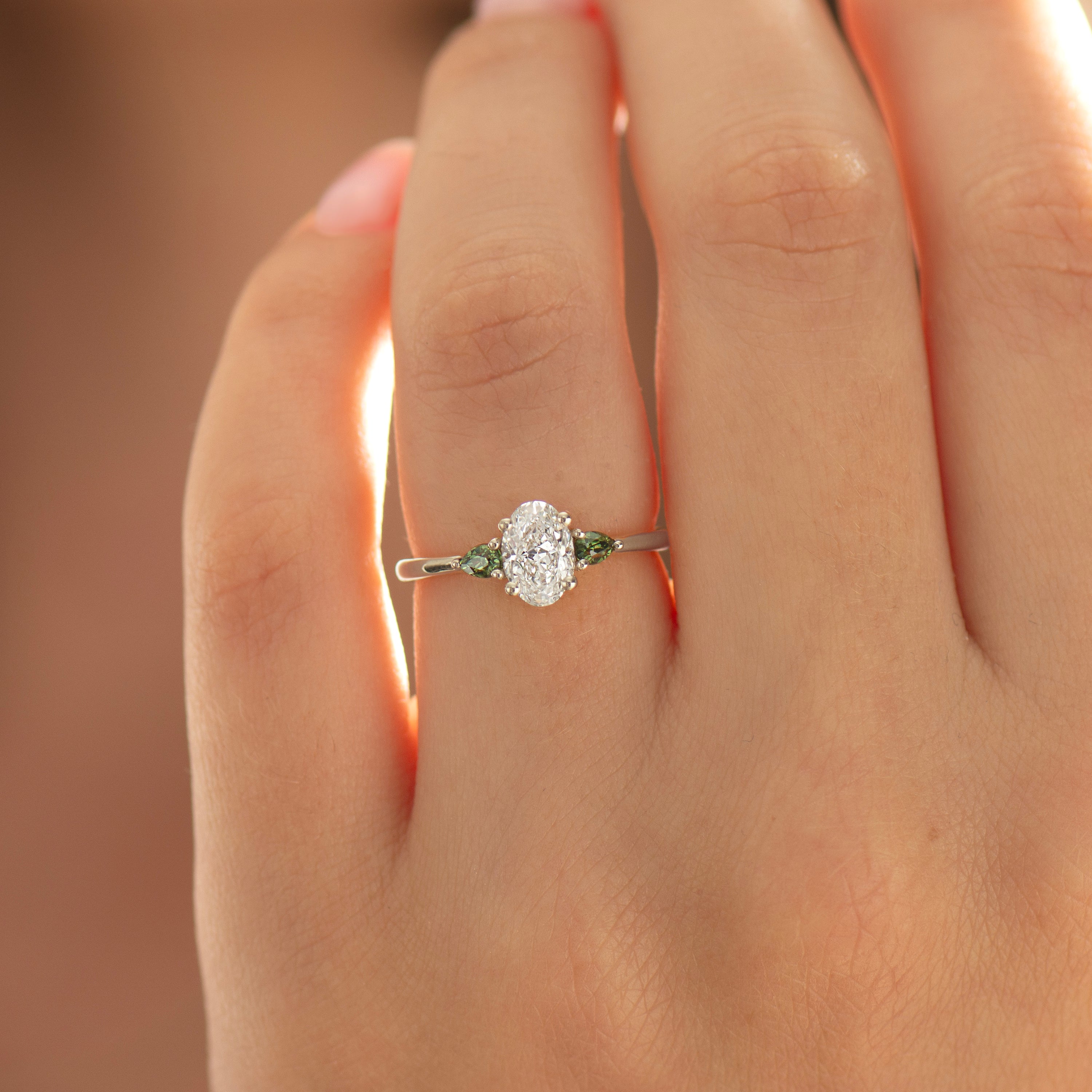 Oval Diamond And Green Sapphire Ring