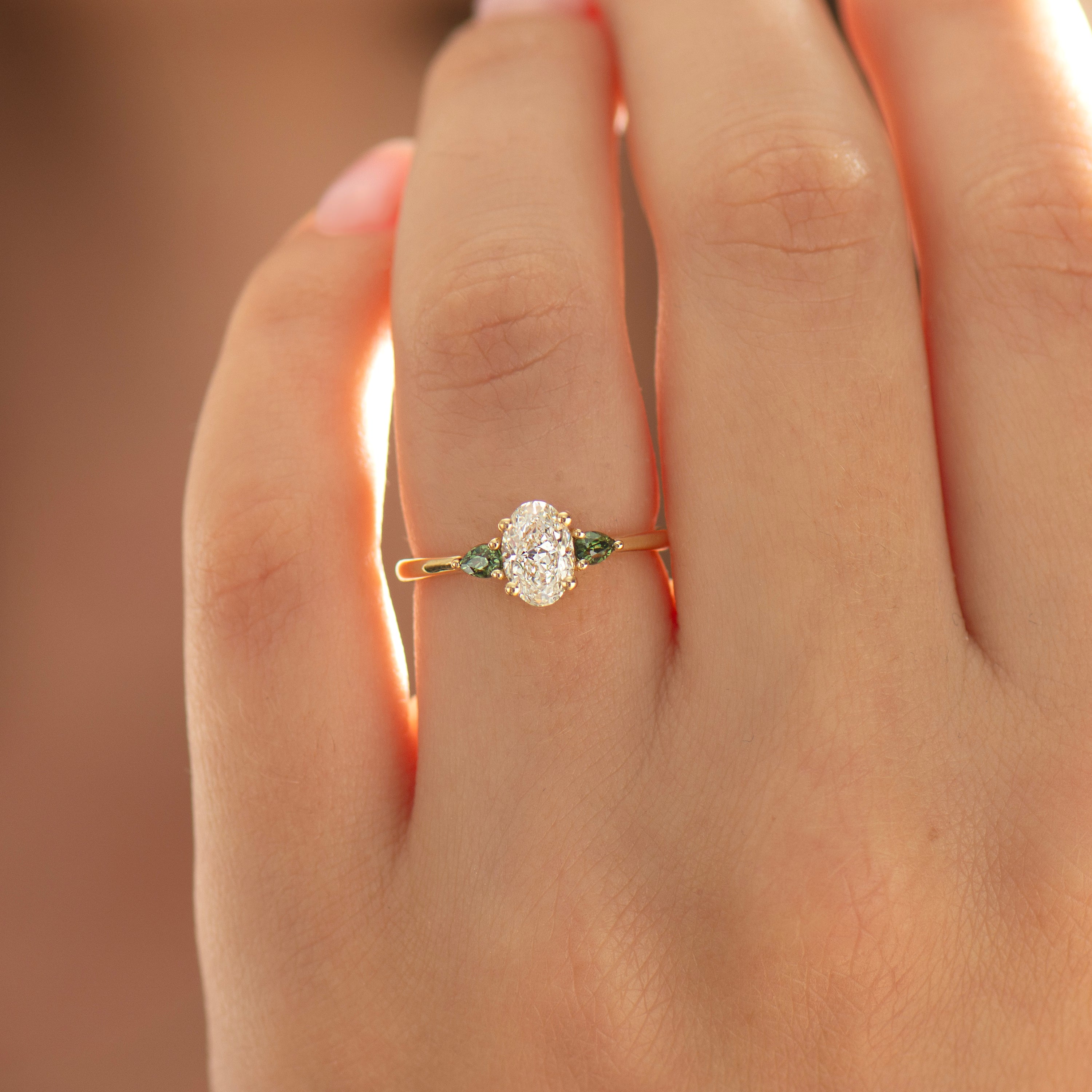 Oval Diamond And Green Sapphire Ring