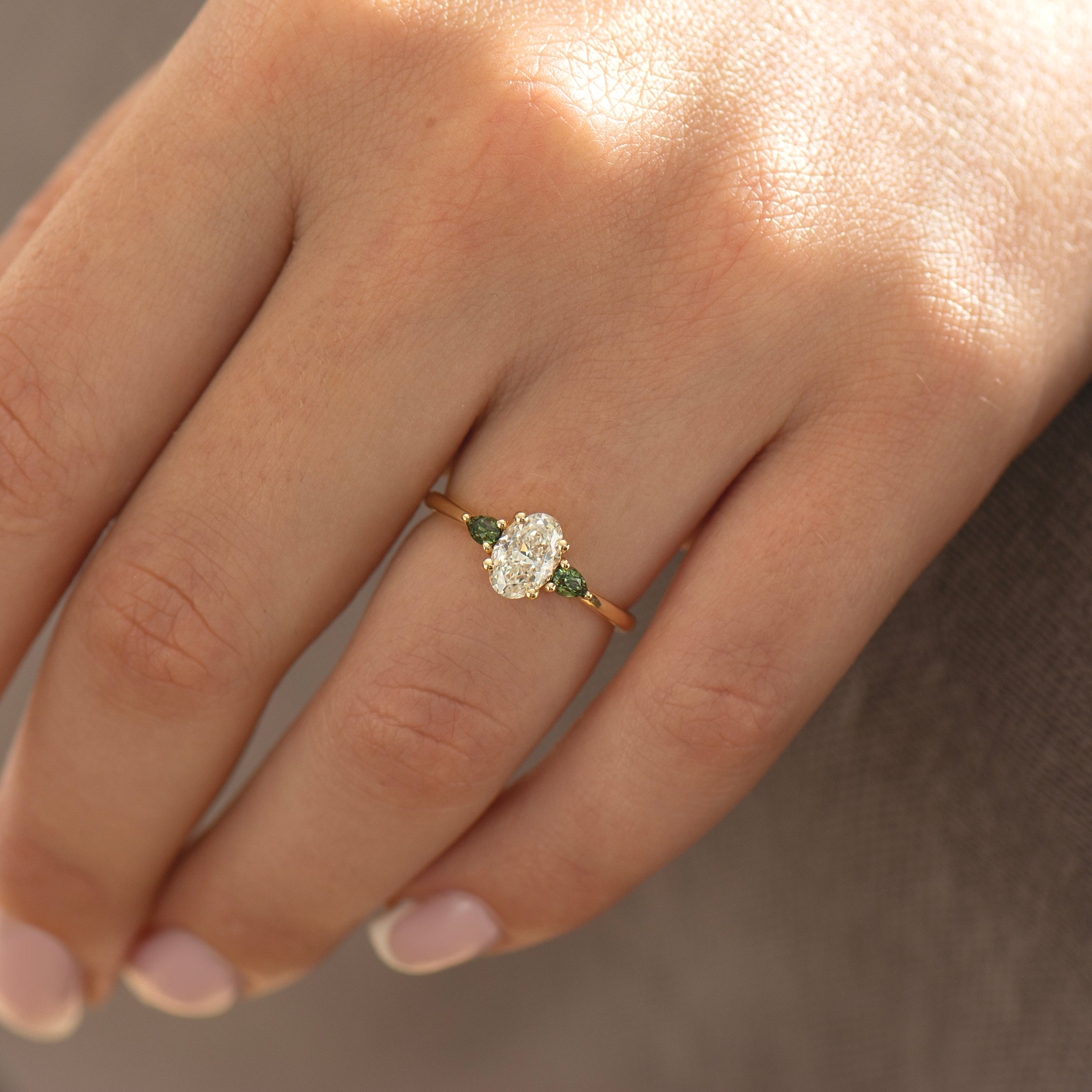 Oval Diamond And Green Sapphire Ring