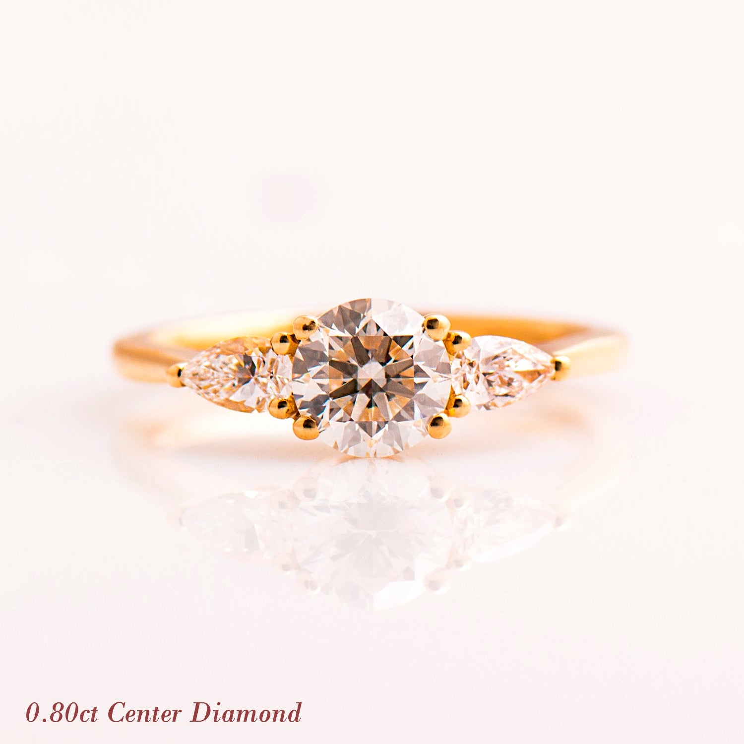 The 3 Stone Ring - Round & Pears