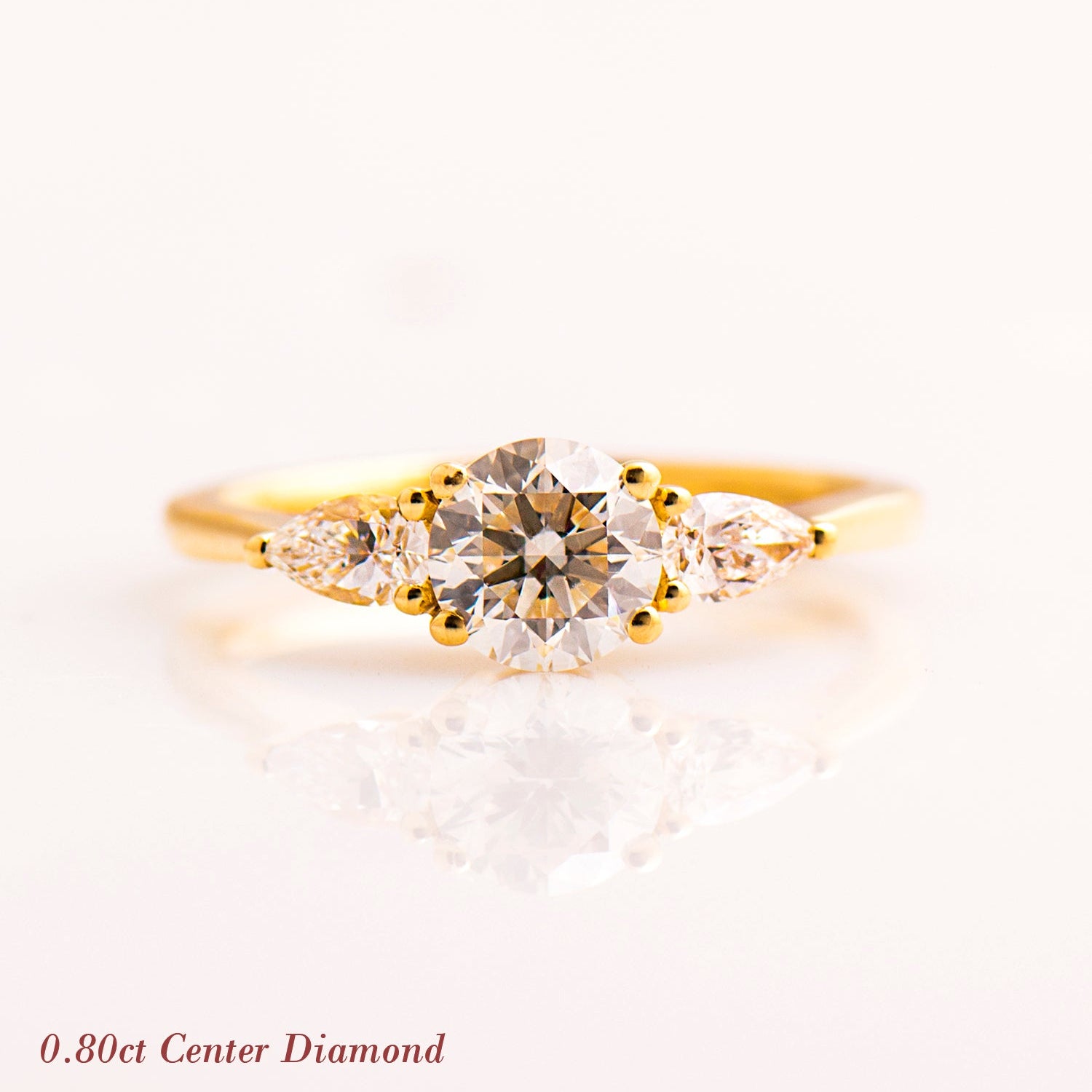 The 3 Stone Ring - Round & Pears
