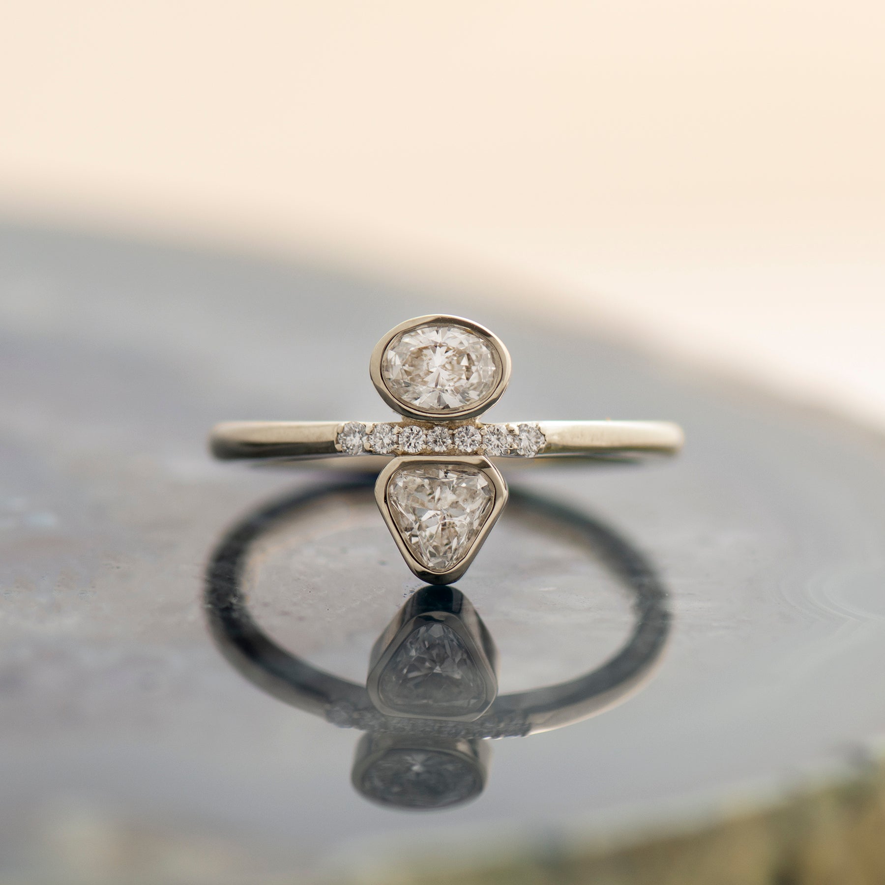 Triangle And Oval Engagement Ring