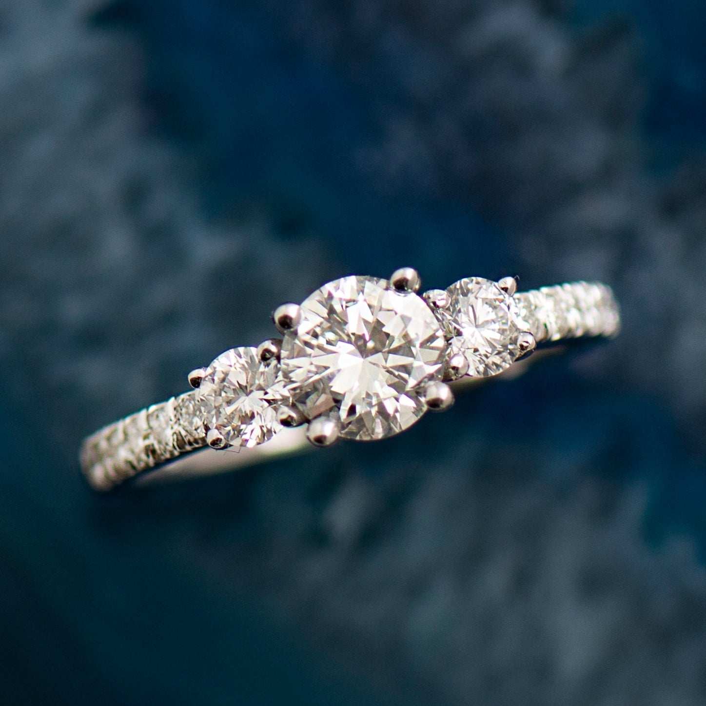 Three Stone Pave Diamonds Ring - 0.7ct Center