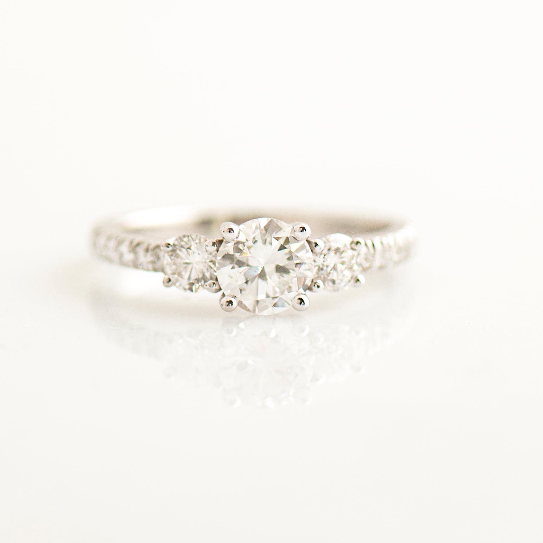 Three Stone Pave Diamonds Ring - 0.7ct Center