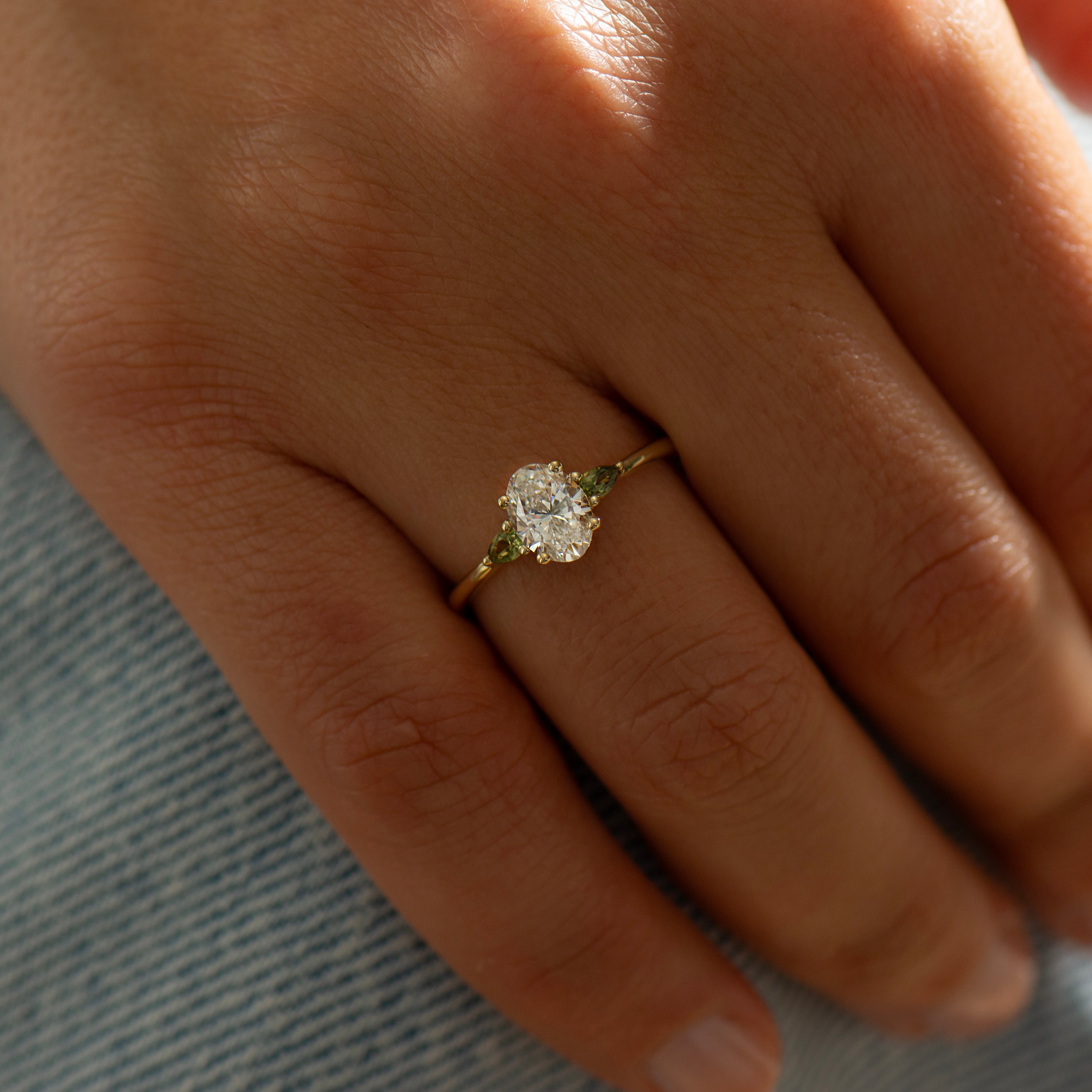 Oval Diamond And Green Sapphire Ring