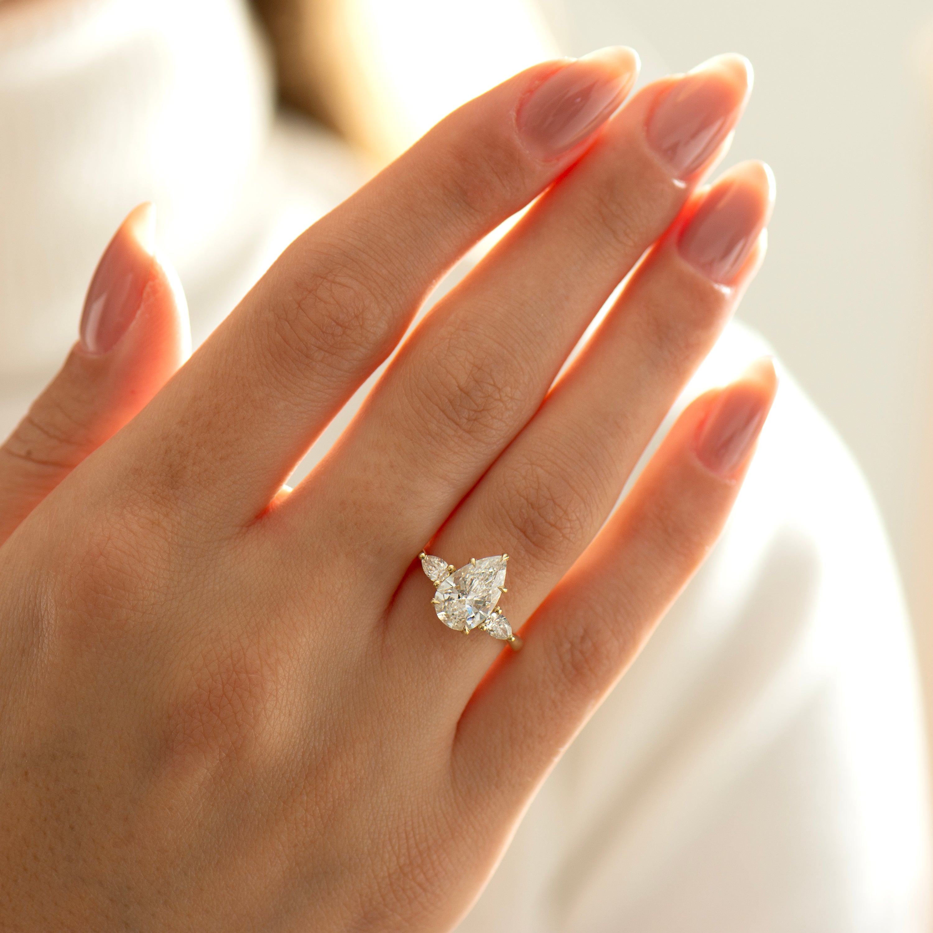 Three Stone Pear Ring