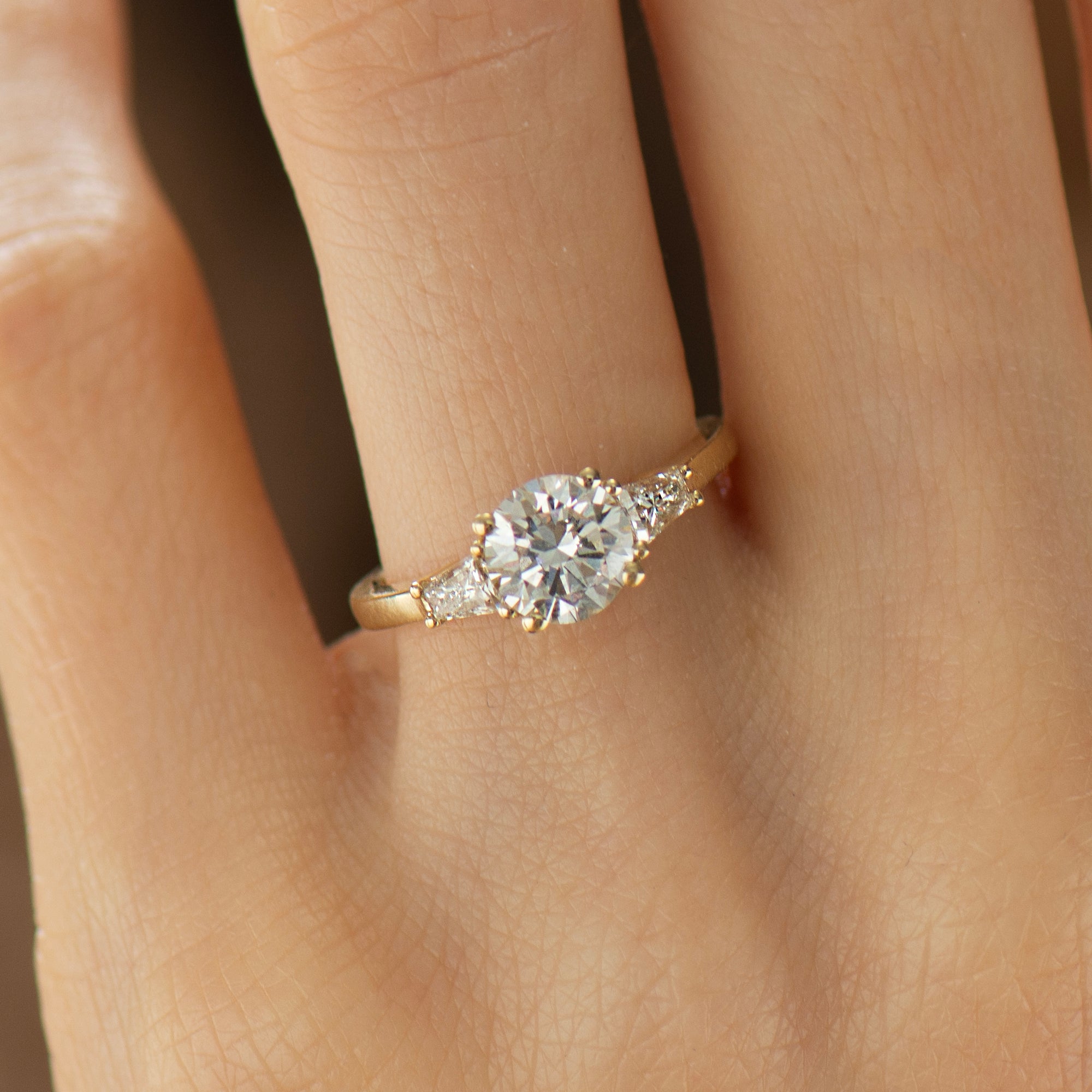 Tapered Princess Side Diamonds Engagement Ring