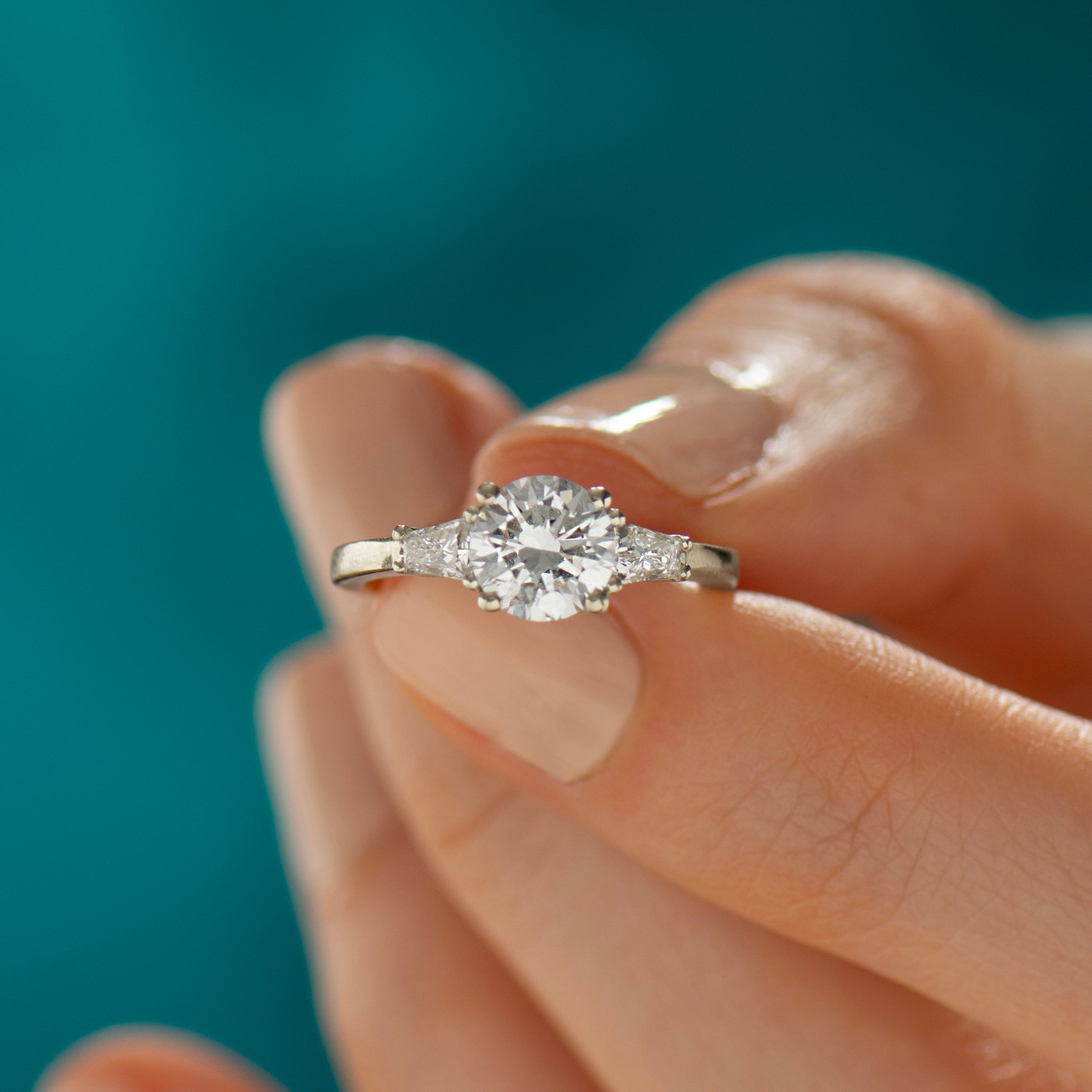 Tapered Princess Side Diamonds Engagement Ring