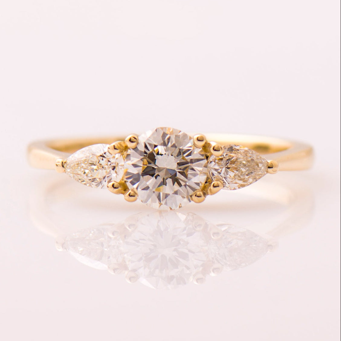 The 3 Stone Ring - Round & Pears
