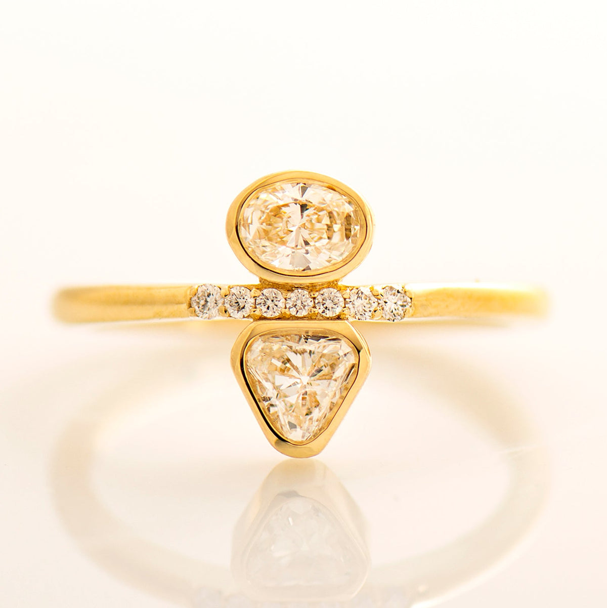 Triangle And Oval Engagement Ring